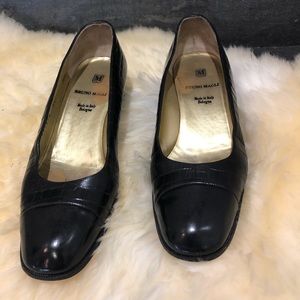 Classic cap toe Bruno Magli shoes.